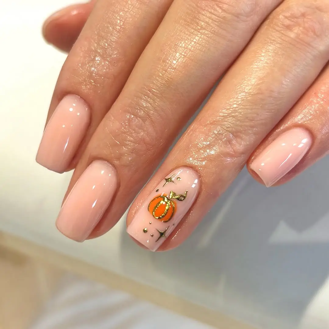 Chic pumpkin nail art for autumn vibes