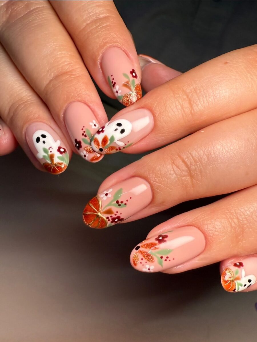 Charming pumpkin-themed nail art design