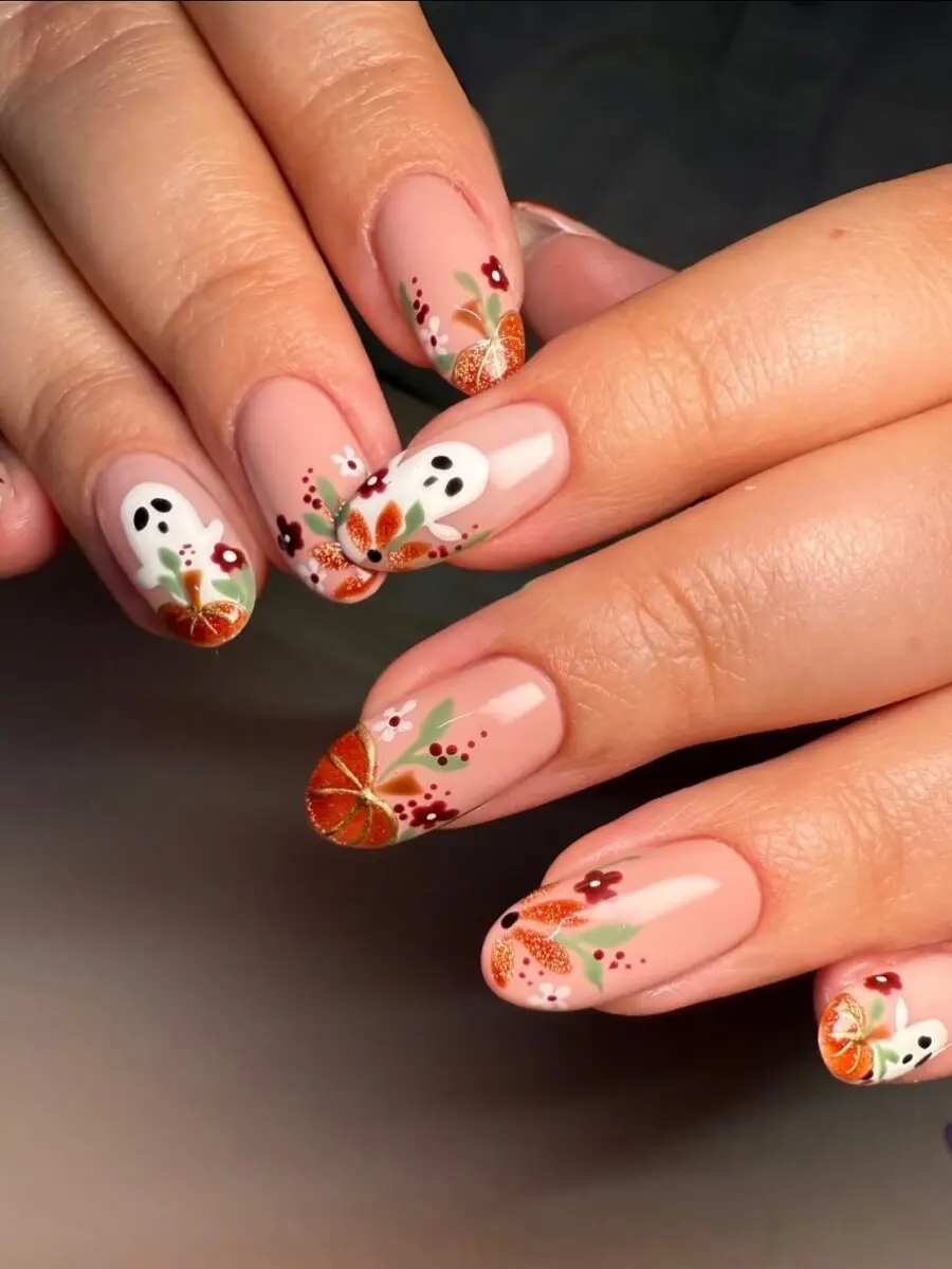 Charming pumpkin-themed nail art design