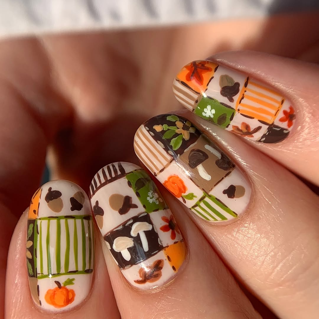 Charming hand-painted pumpkin nail art