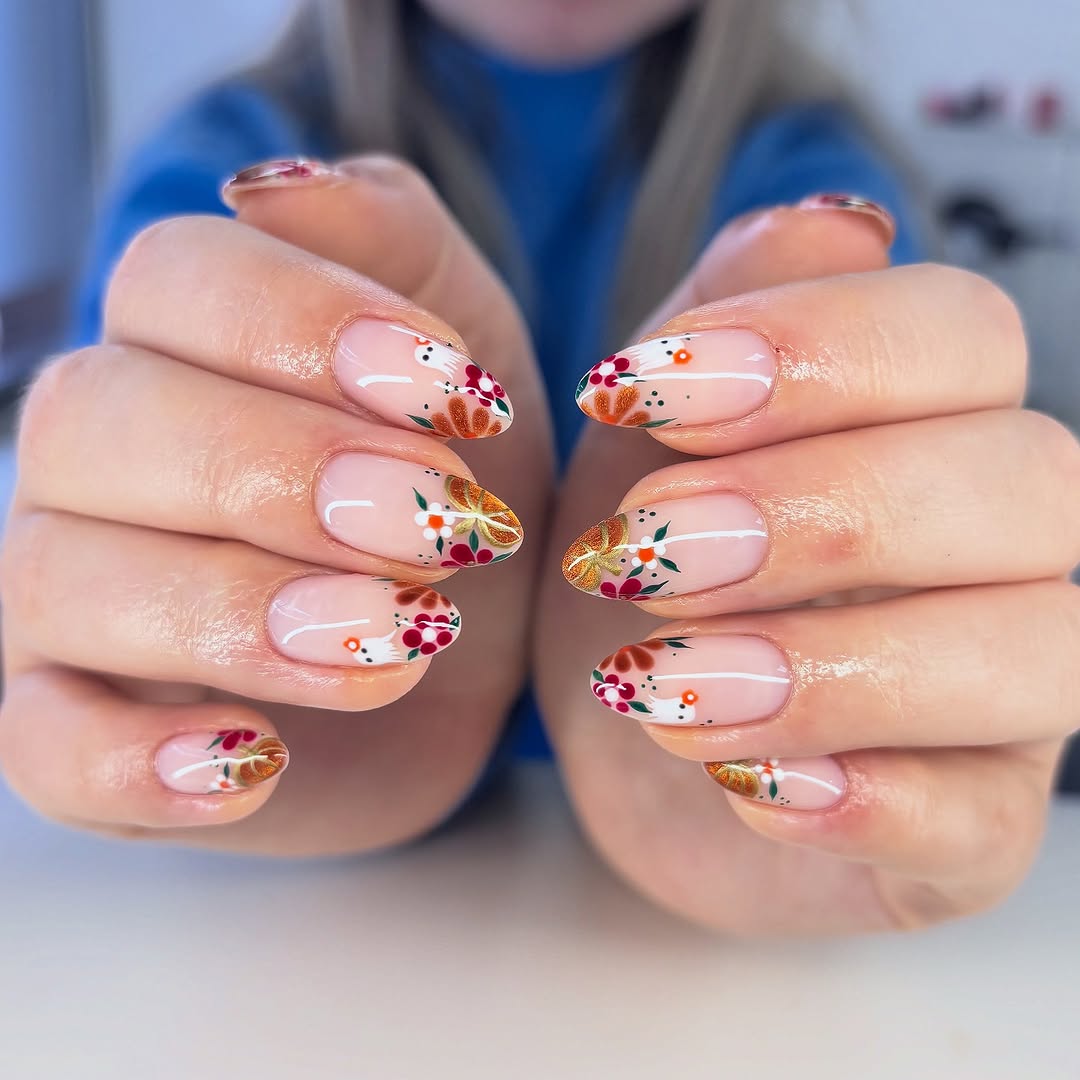 Charming autumn-inspired pumpkin nail art design
