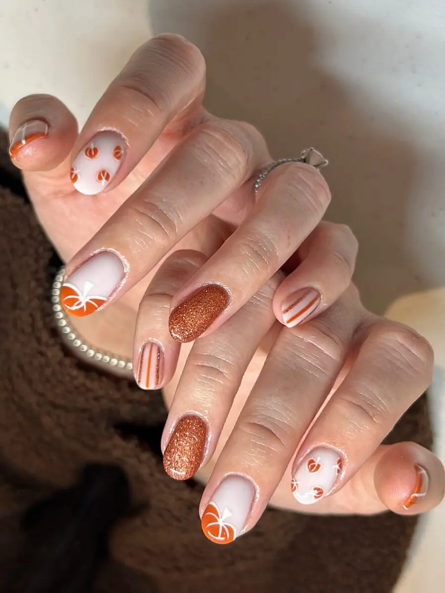 Chic Pumpkin-Themed Nail Art for Fall