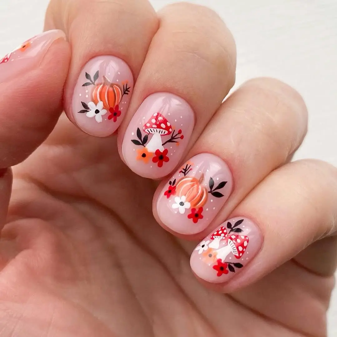 Charming pumpkin-themed nail art for autumn