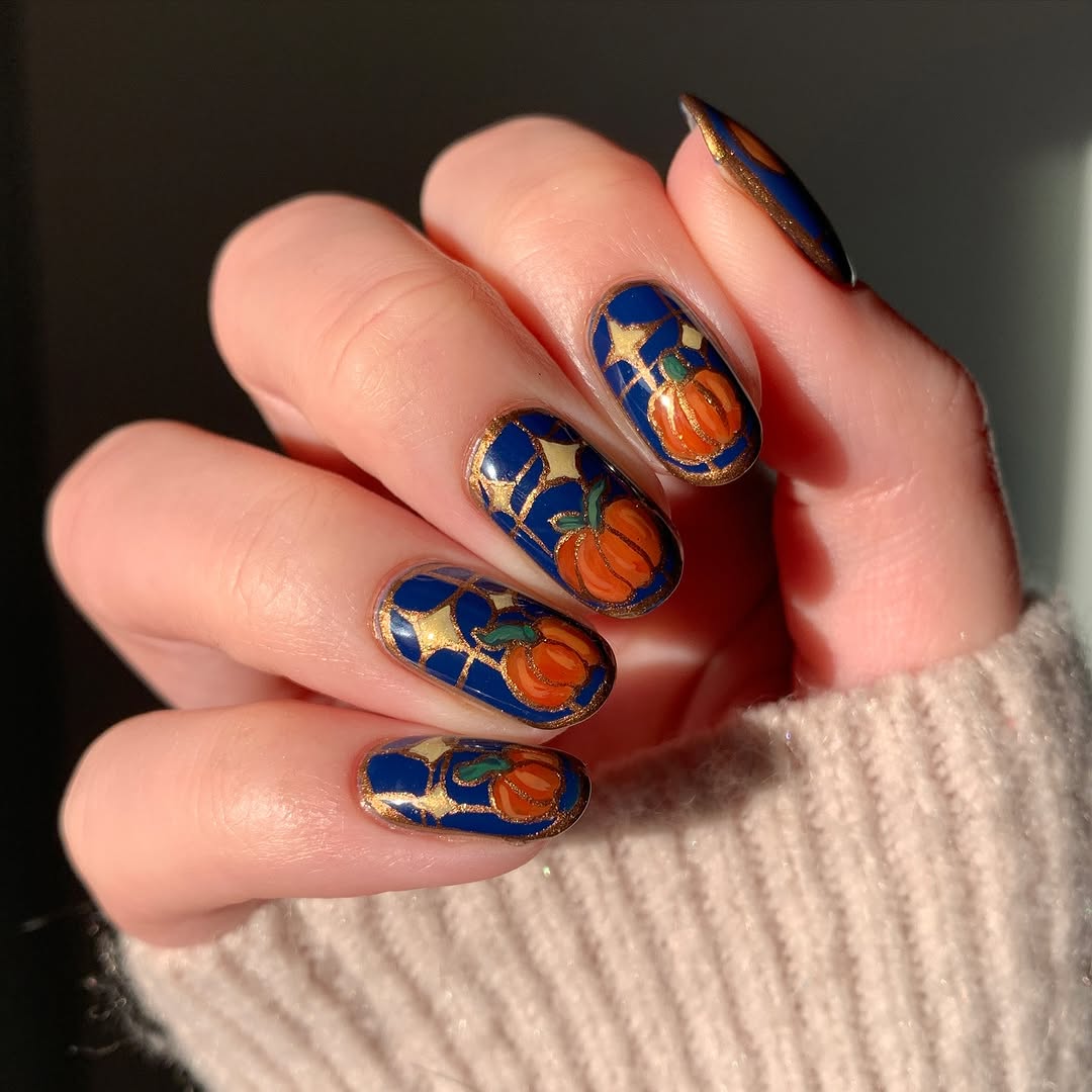 Vibrant Pumpkin-Themed Nail Art for Fall