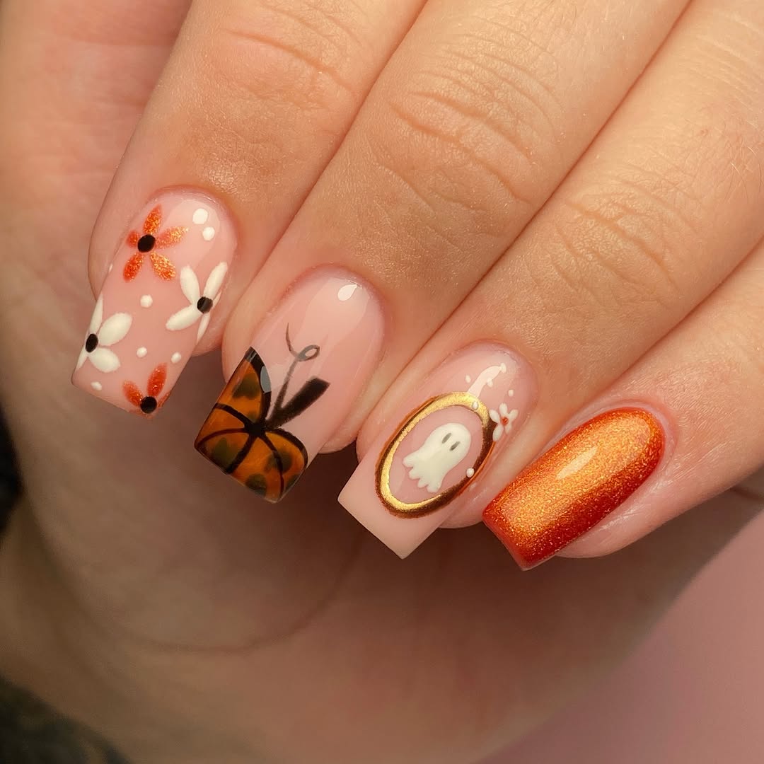 Charming autumn-themed pumpkin nail designs