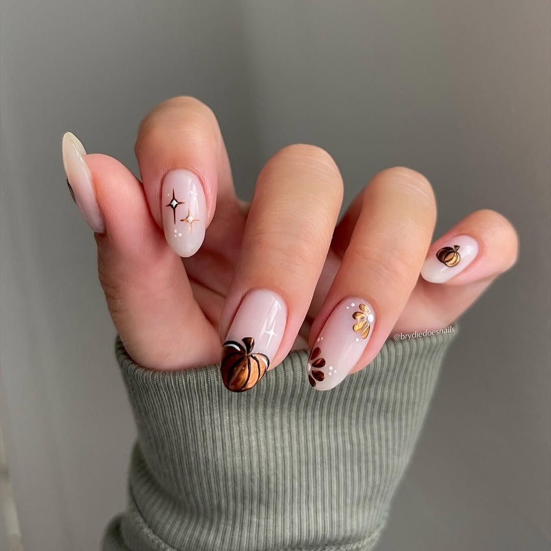 Chic pumpkin-themed nail art for fall