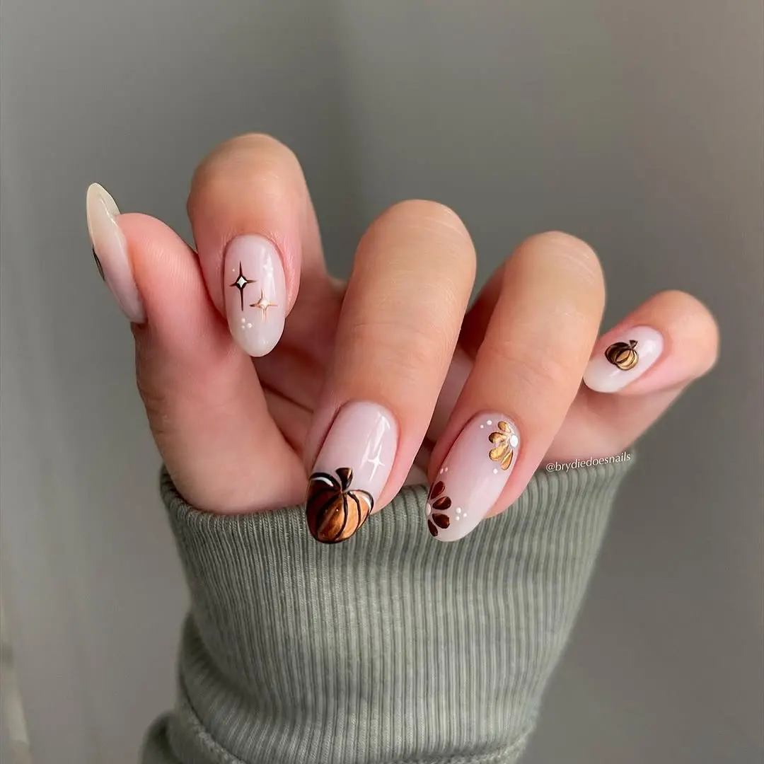 Chic pumpkin-themed nail art for fall
