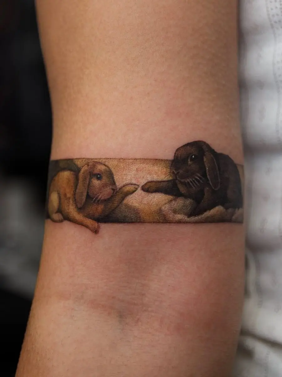 Adorable rabbits in vibrant colors on skin