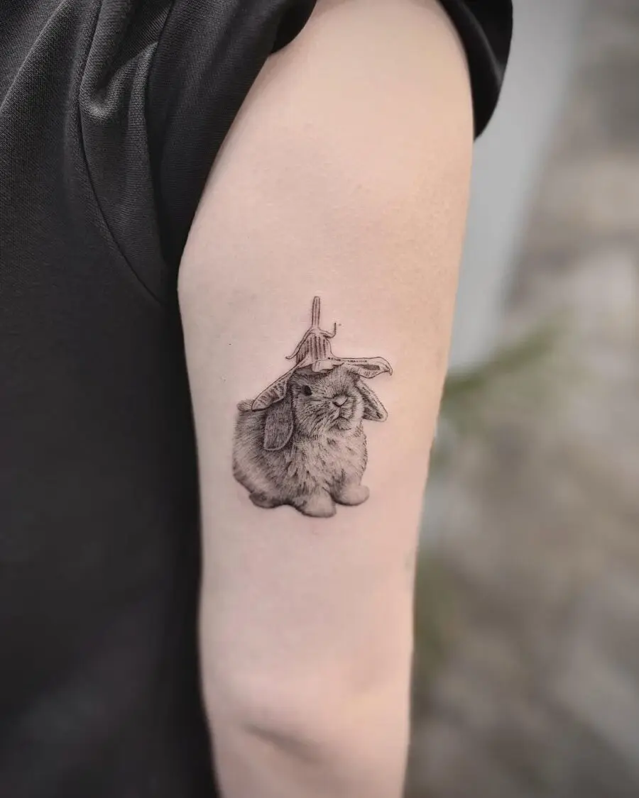 Charming rabbit tattoo with a playful hat