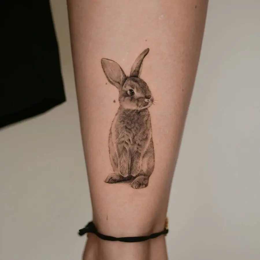 Realistic rabbit tattoo showcasing lifelike details