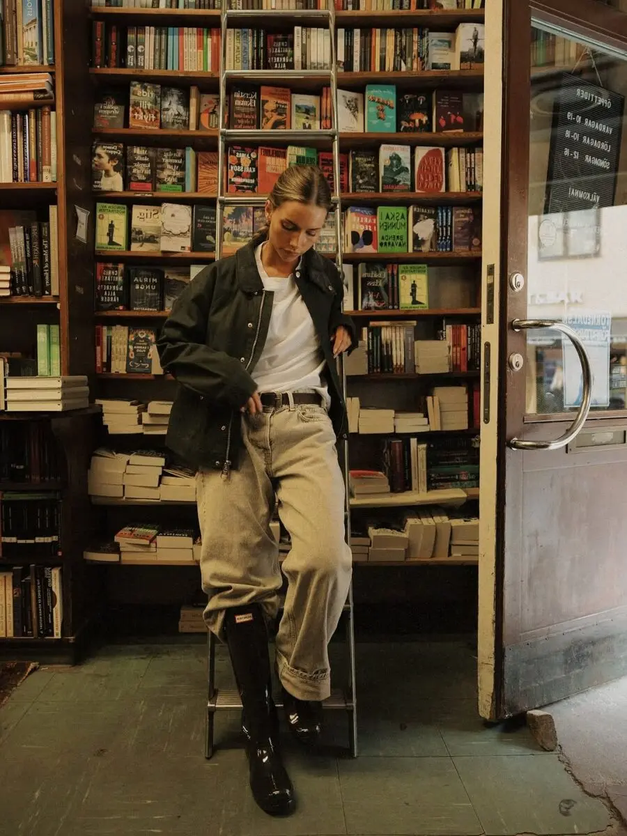 Chic rainy day style in a cozy library