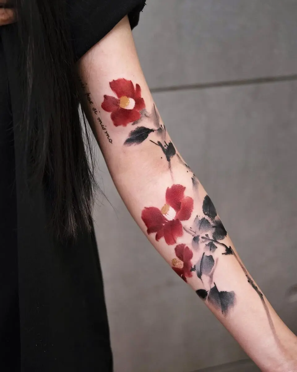 Stunning Red Camellia Arm Tattoo Inspiration