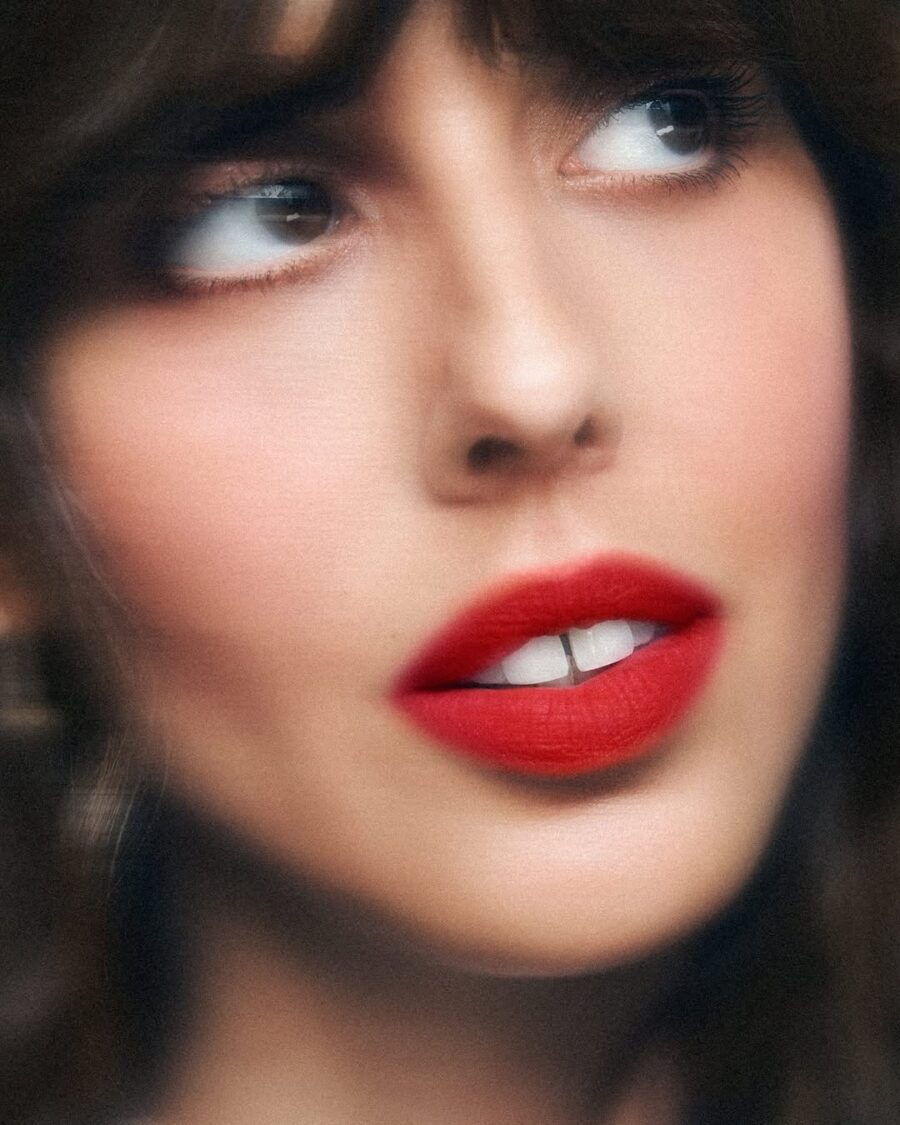 Vibrant red lipstick with flawless skin finish
