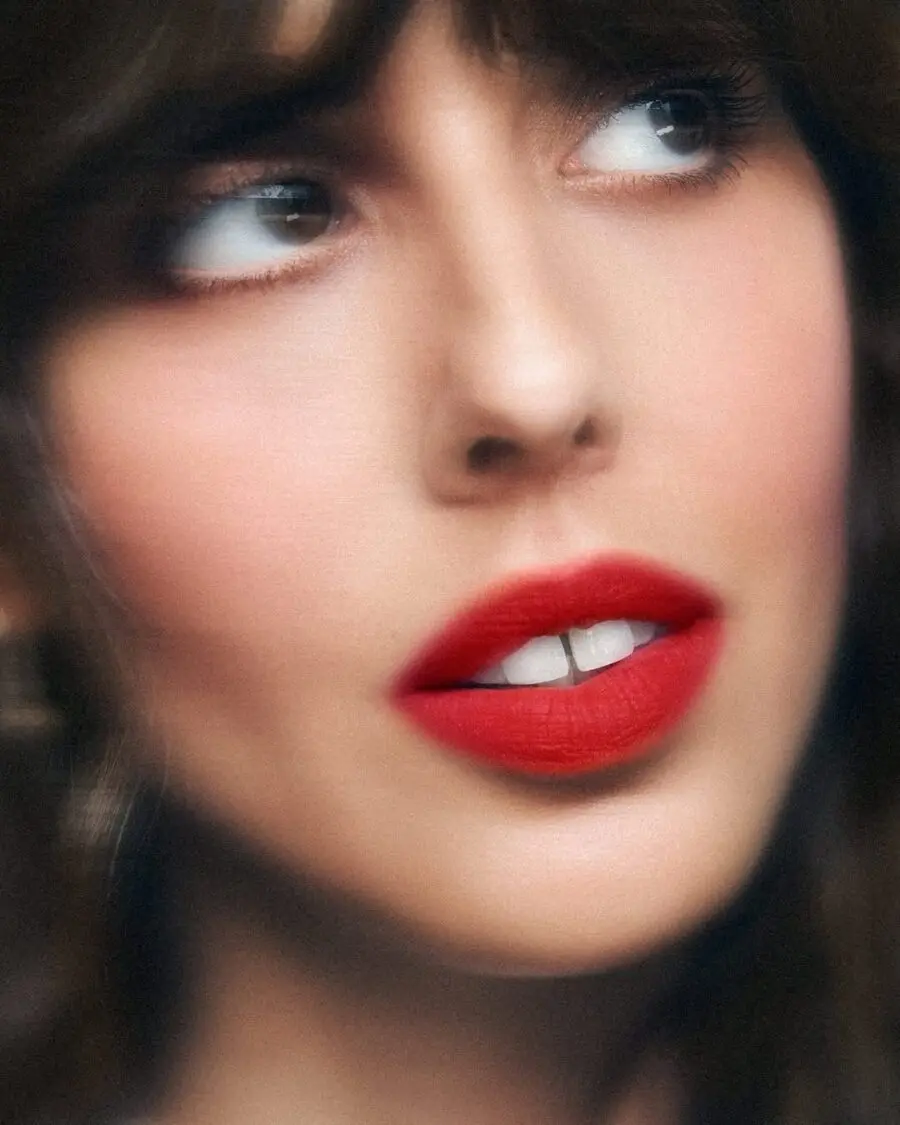 Vibrant red lipstick with flawless skin finish