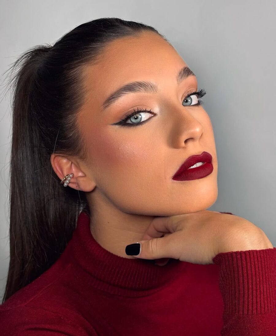 Bold red lips enhance elegant makeup style