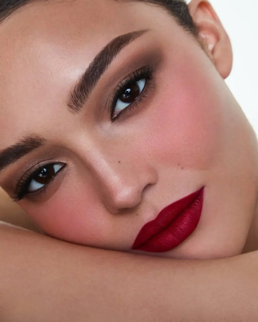 Bold red lips with soft glam vibes