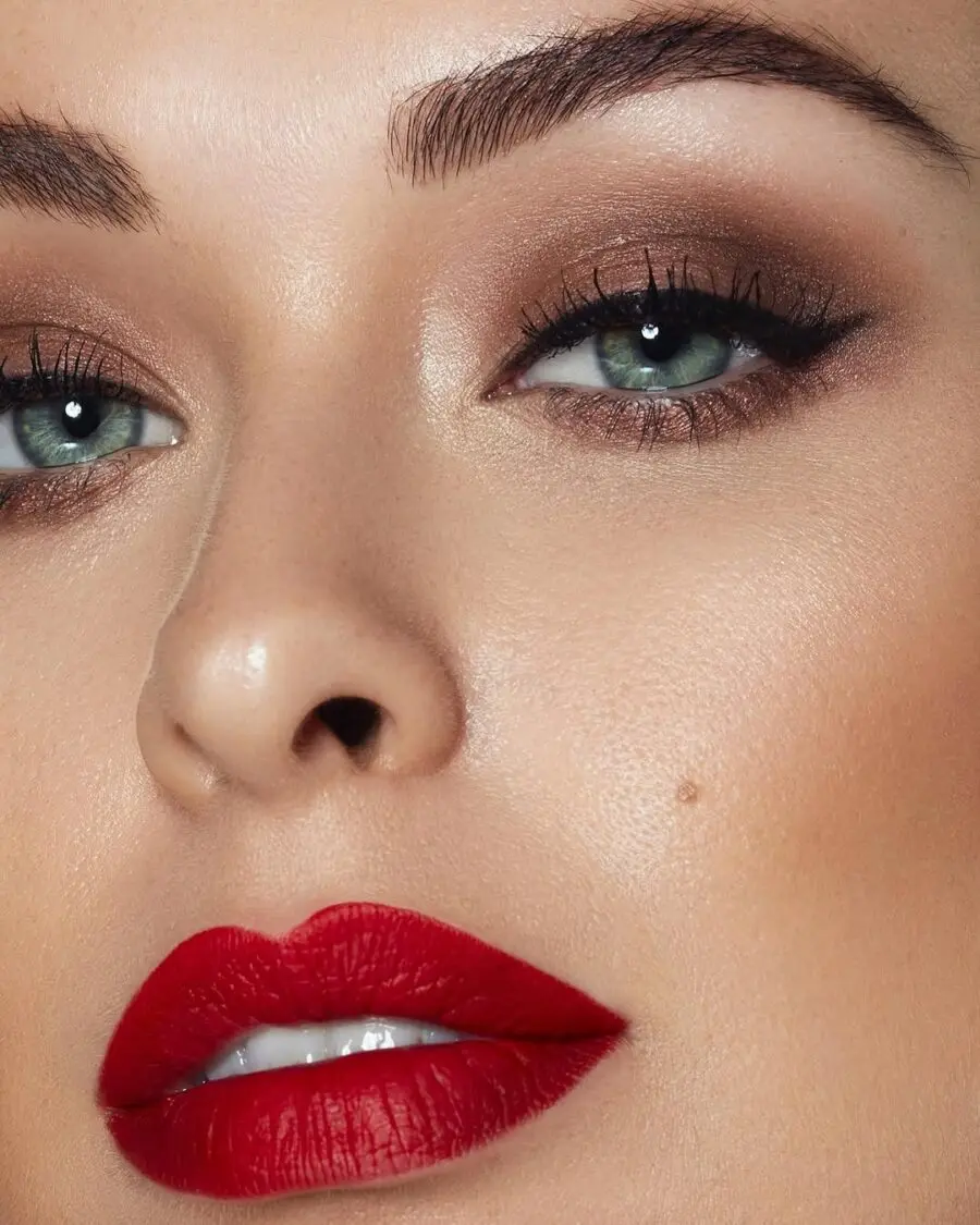 Stunning red lipstick with glamorous eye makeup