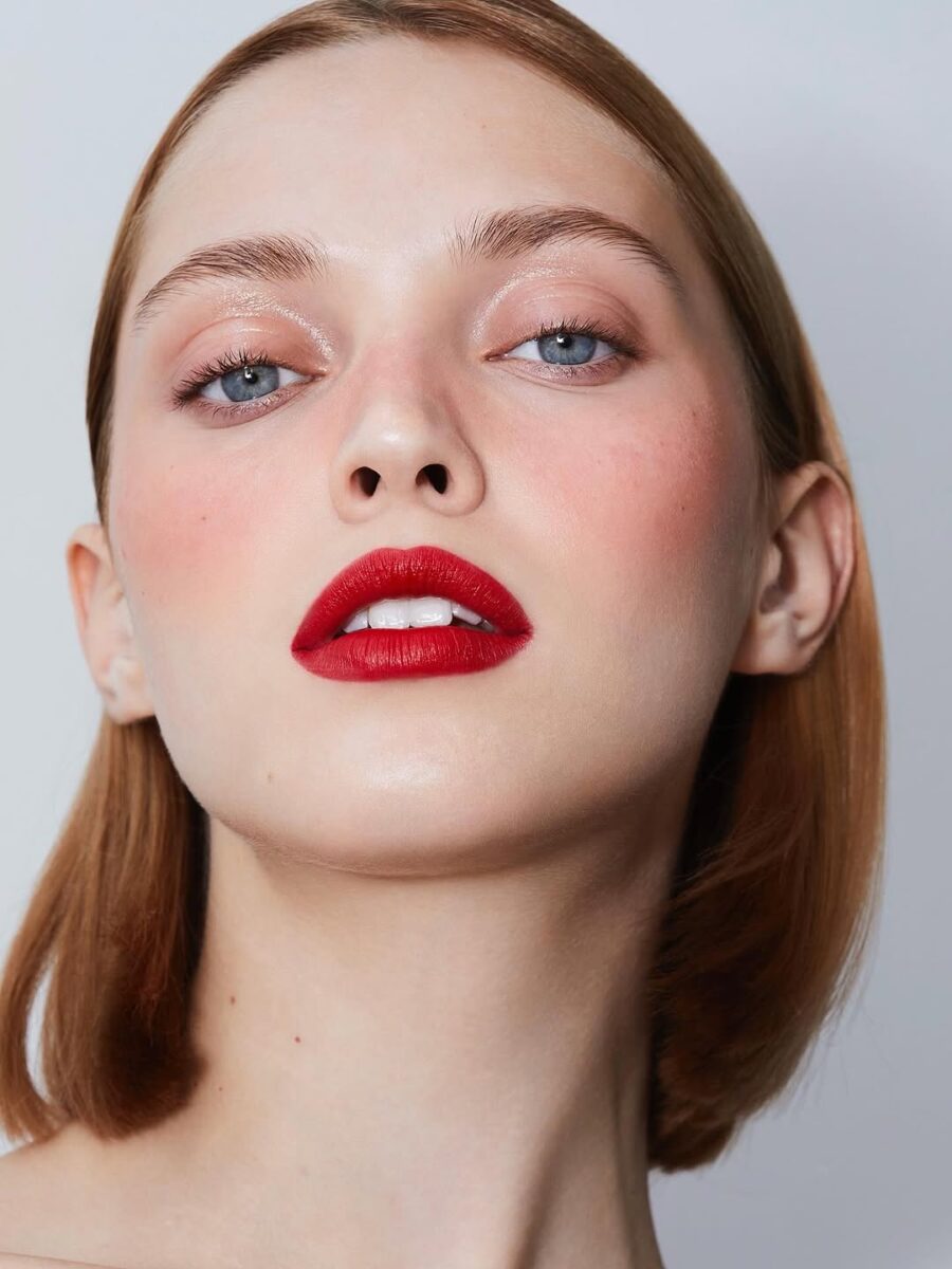 Bold red lips with fresh, natural glow