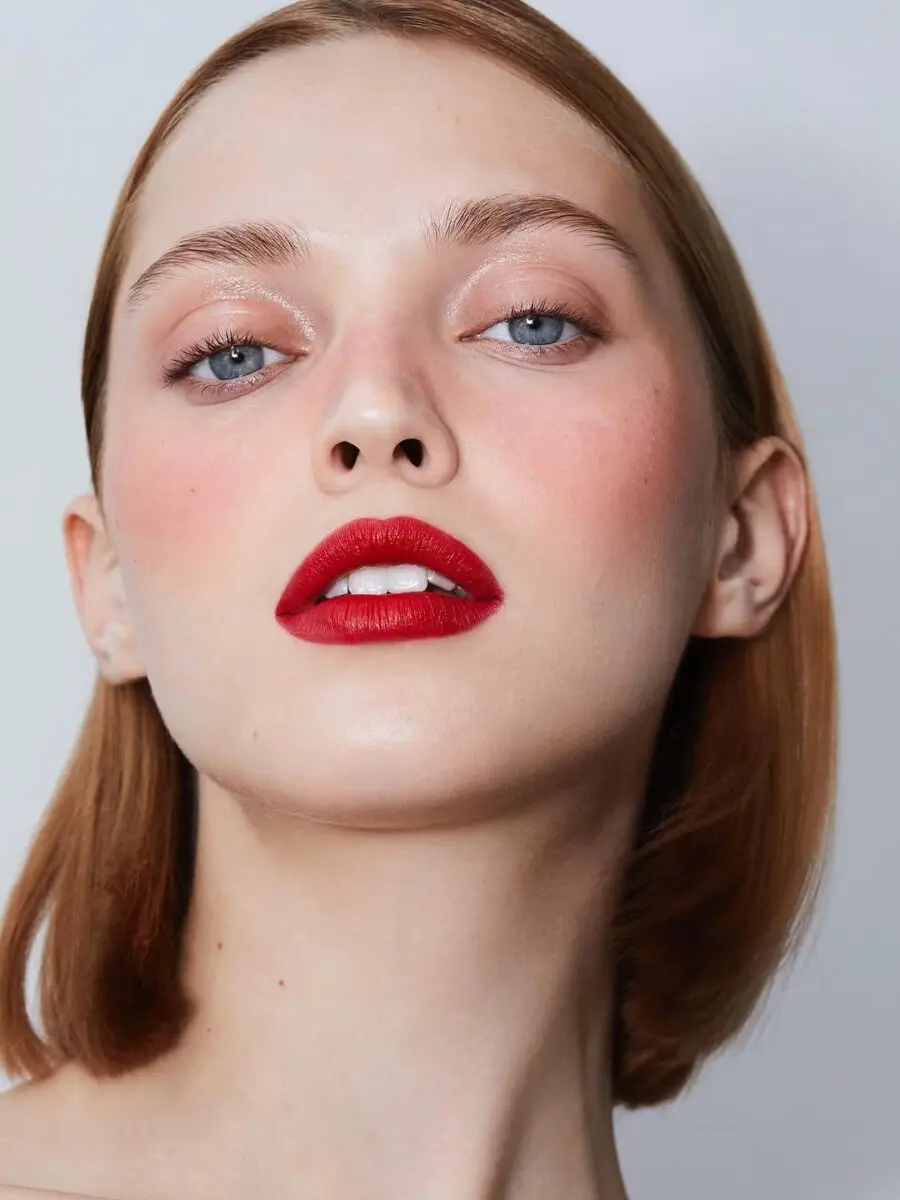 Bold red lips with fresh, natural glow