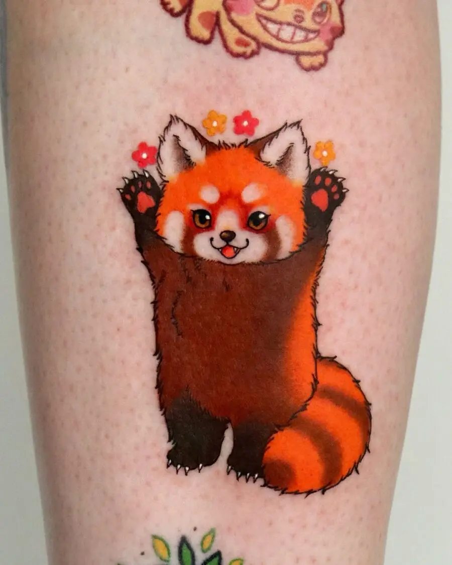Adorable red panda tattoo with vibrant florals
