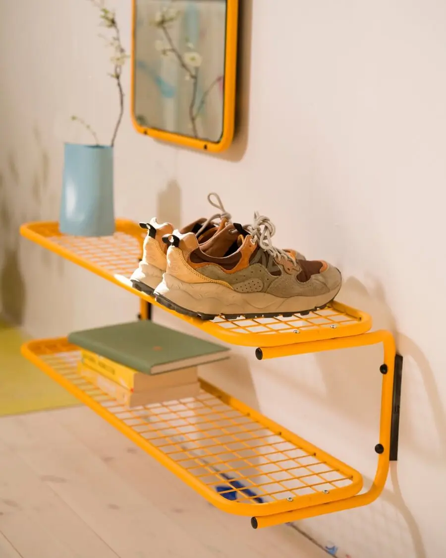 Stylish yellow shelf for shoe display