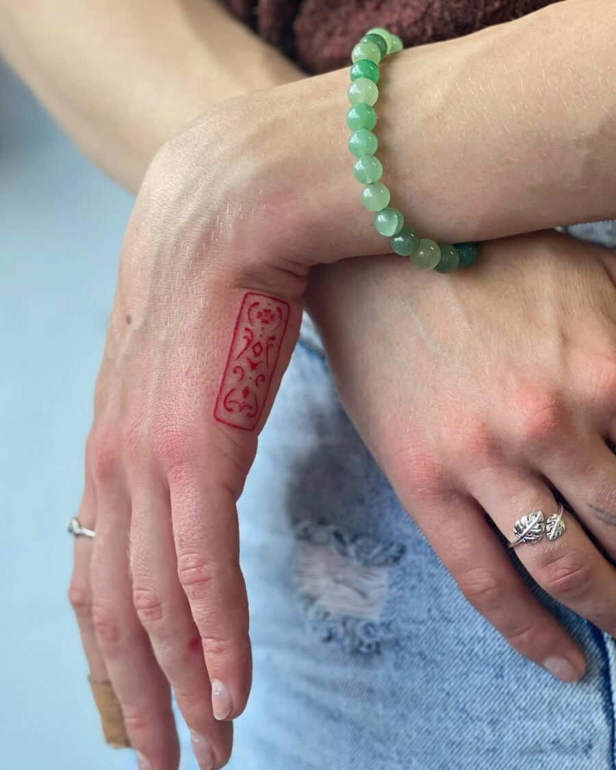 Stylish side hand tattoo with delicate details