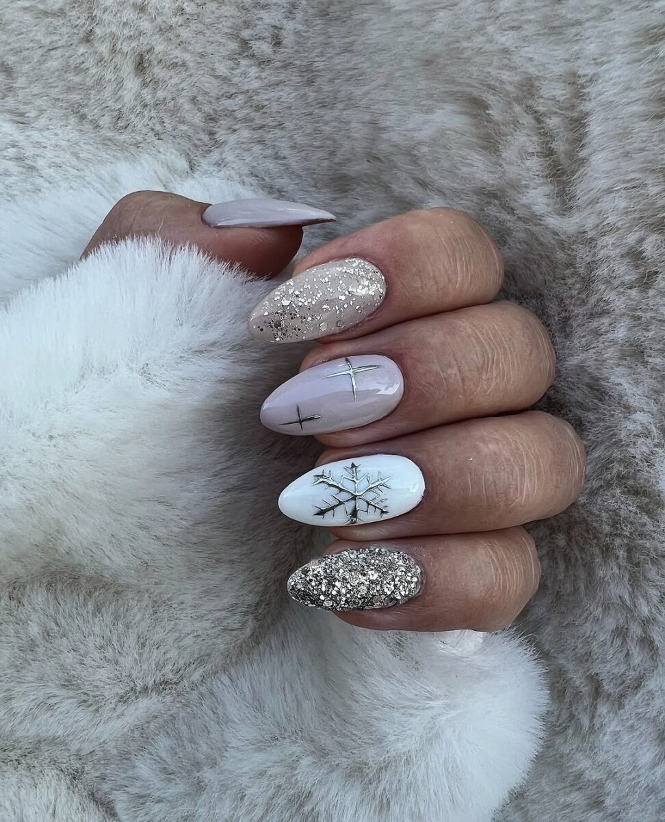 Elegant snowflake nails with winter sparkle