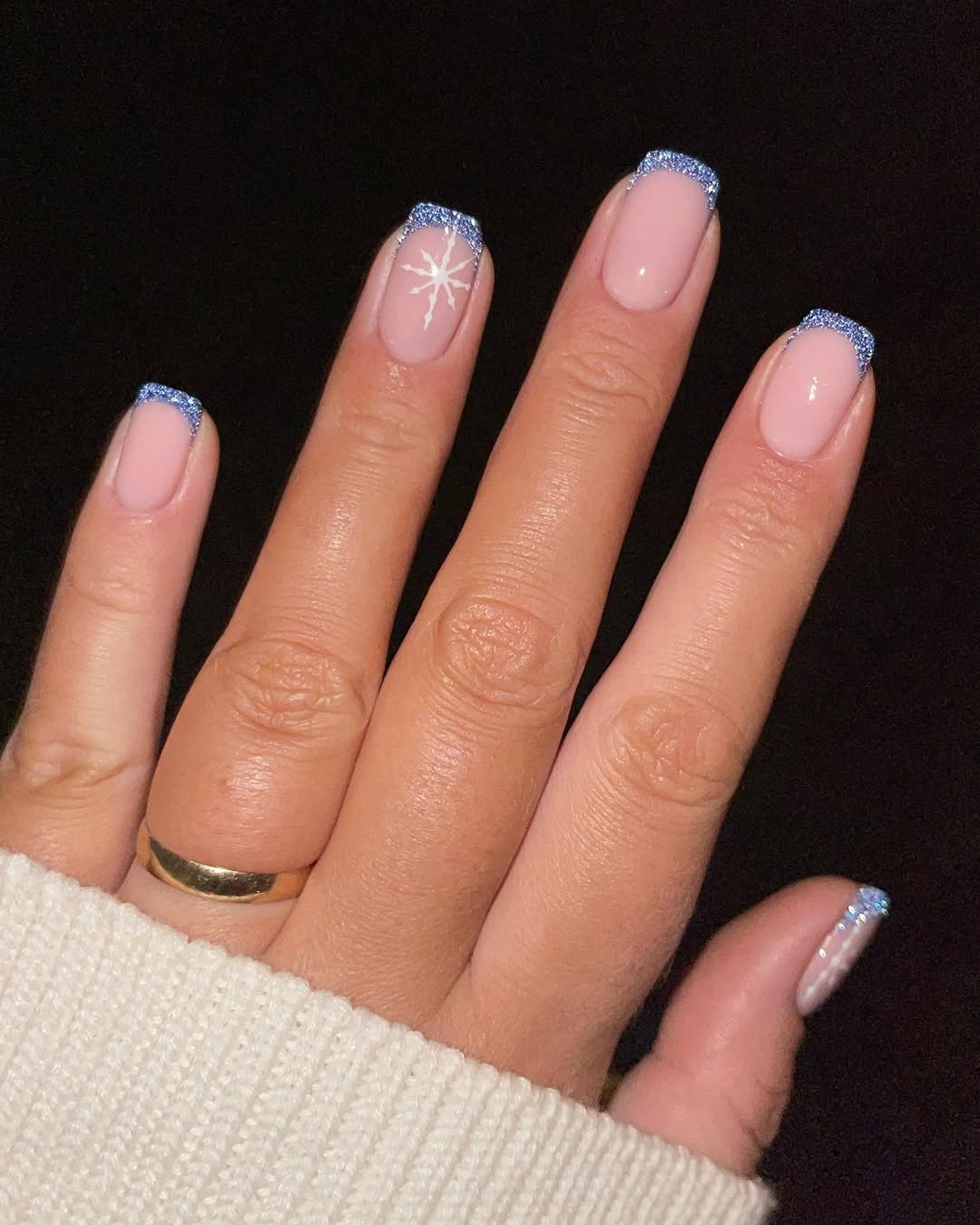 Chic Blue Glitter Snowflake Nail Design