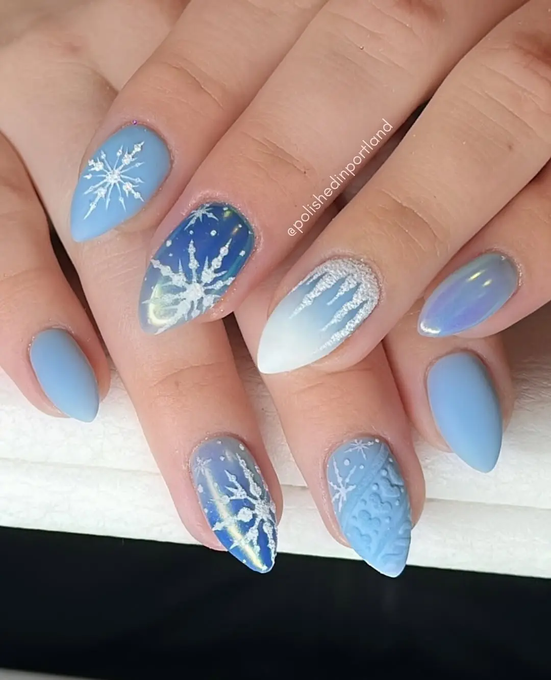 Charming winter-themed snowflake nail art