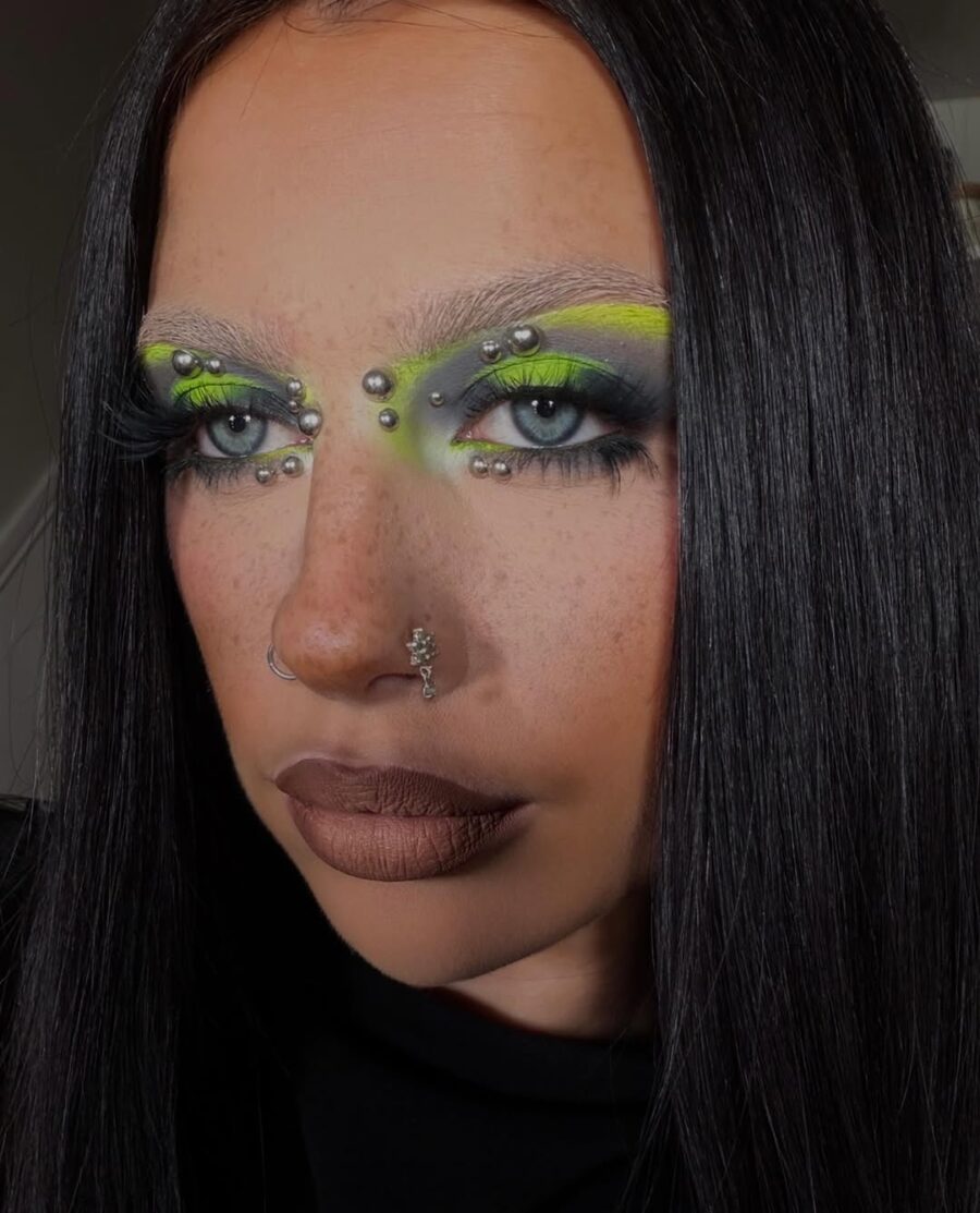 Bold neon accentuates grunge-inspired makeup style