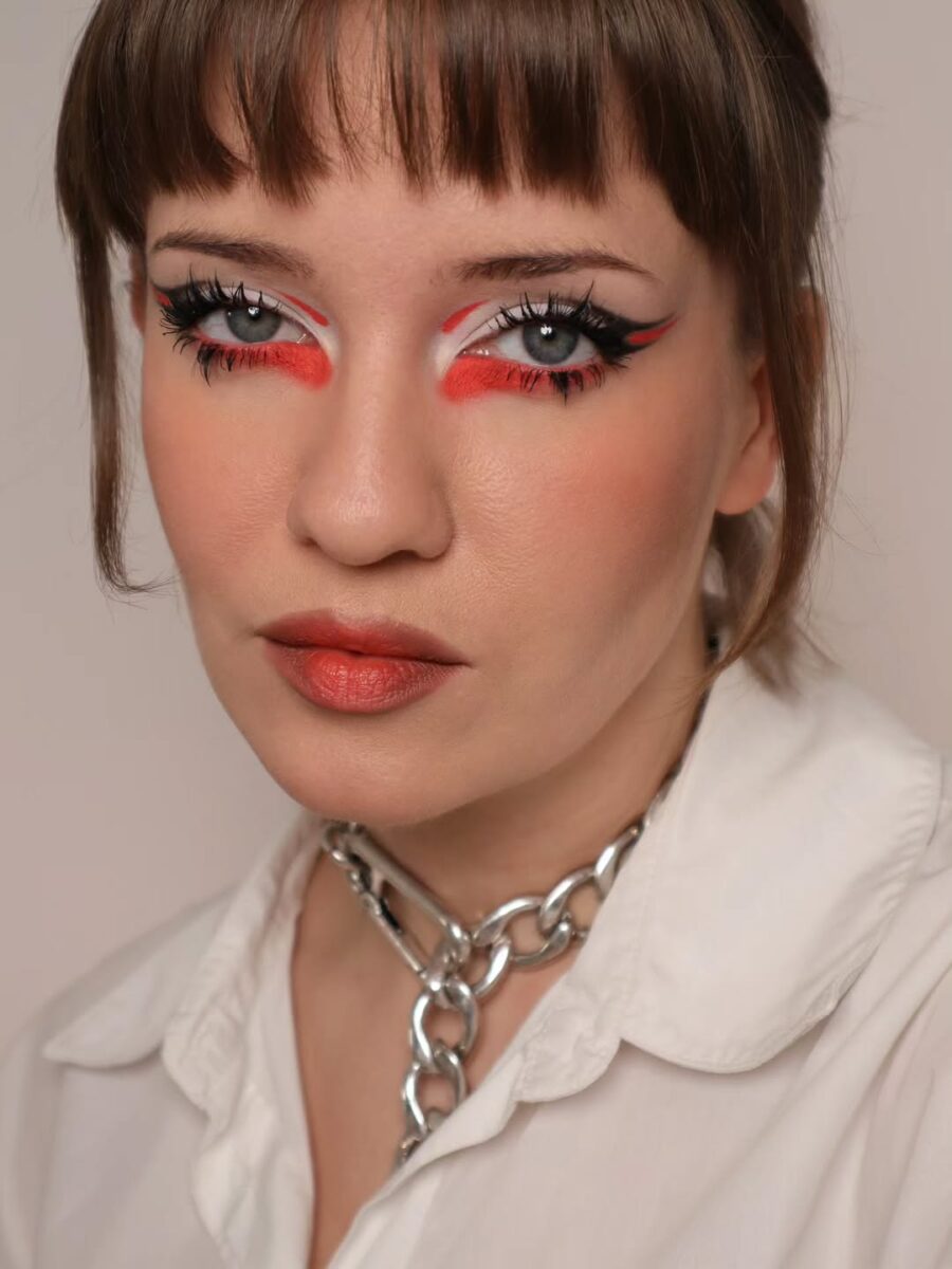 Vibrant red and black soft grunge makeup