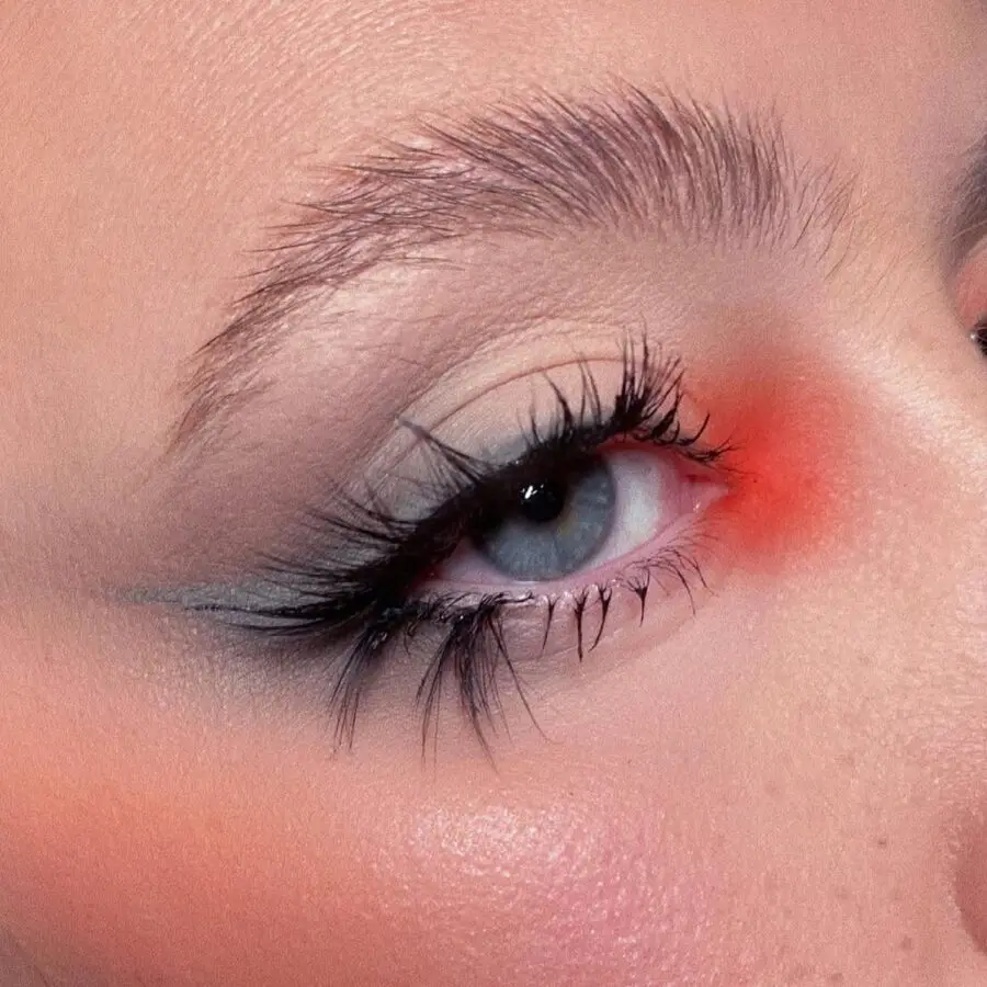 Bold red hues meet soft grunge aesthetics