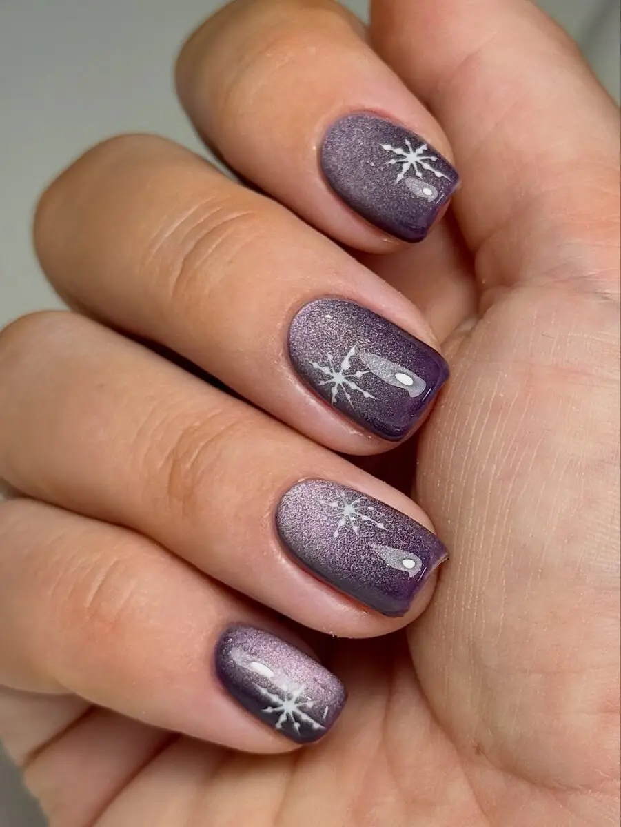 Chic winter-themed snowflake nail design