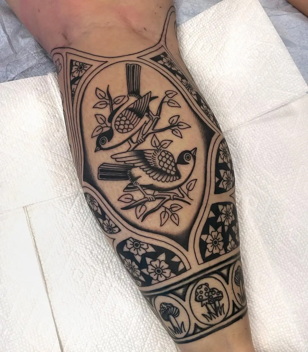 Elegant sparrow tattoos showcasing natural beauty