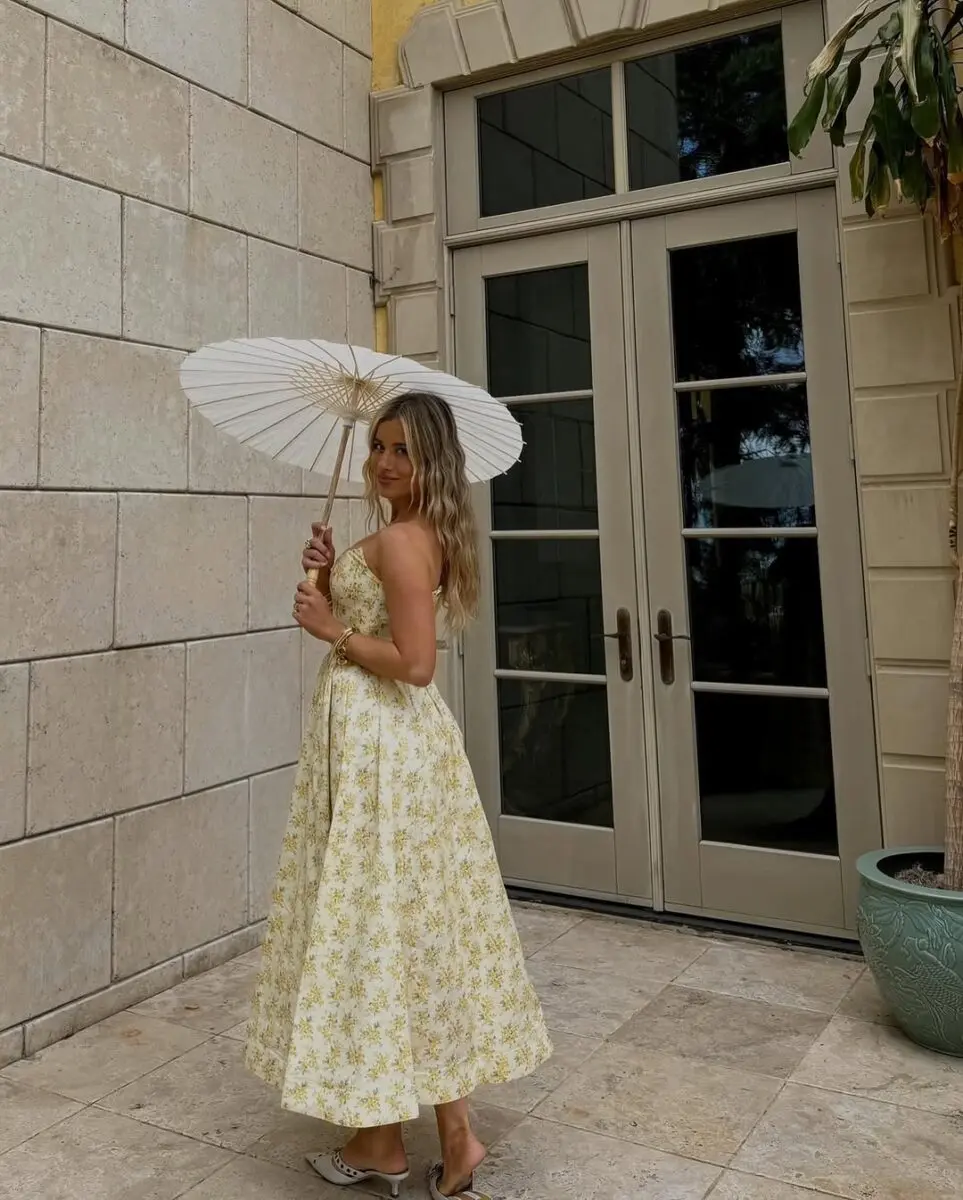 Chic Spring Dress with Elegant Parasol Accessory