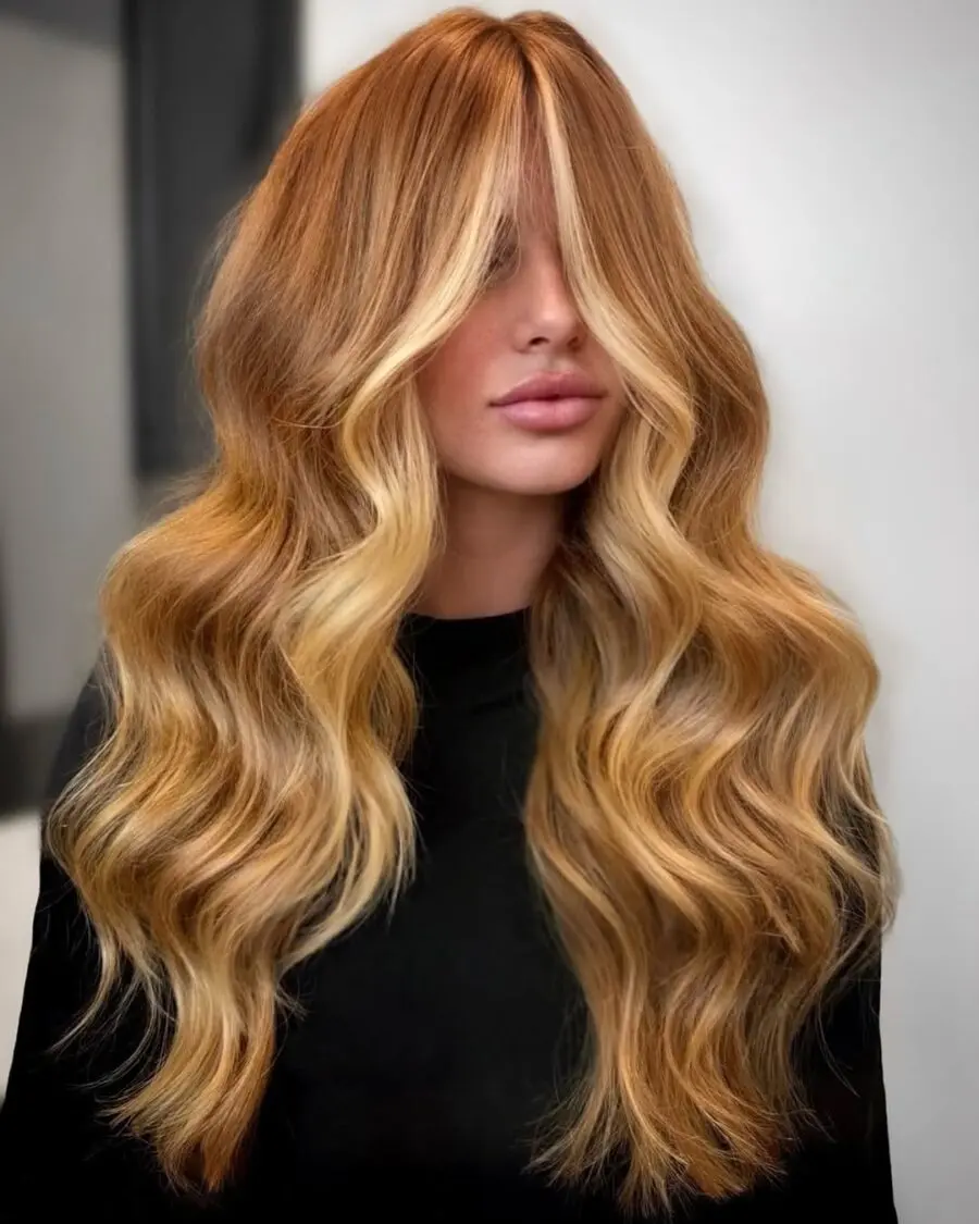 Gorgeous long waves in strawberry blonde hues