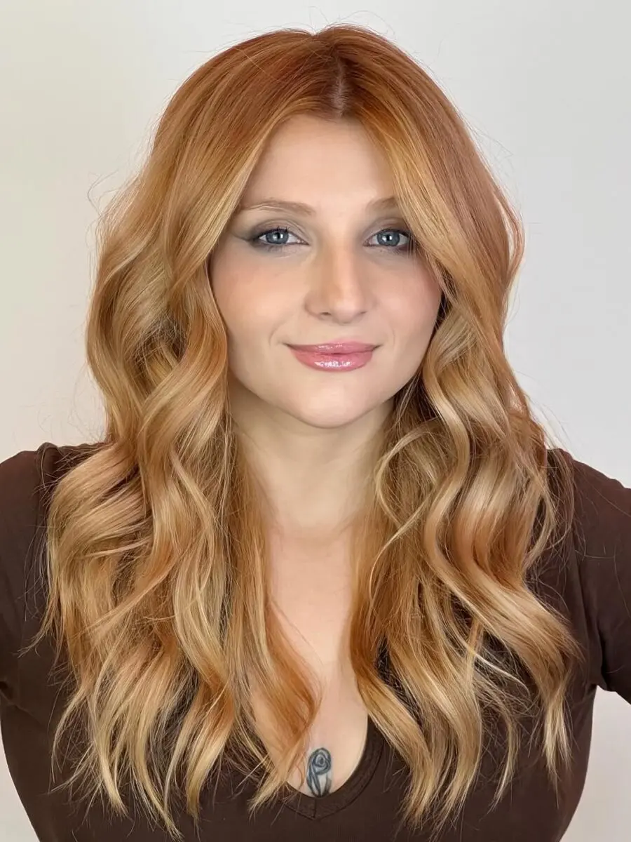 Stylish Long Wavy Strawberry Blonde Look