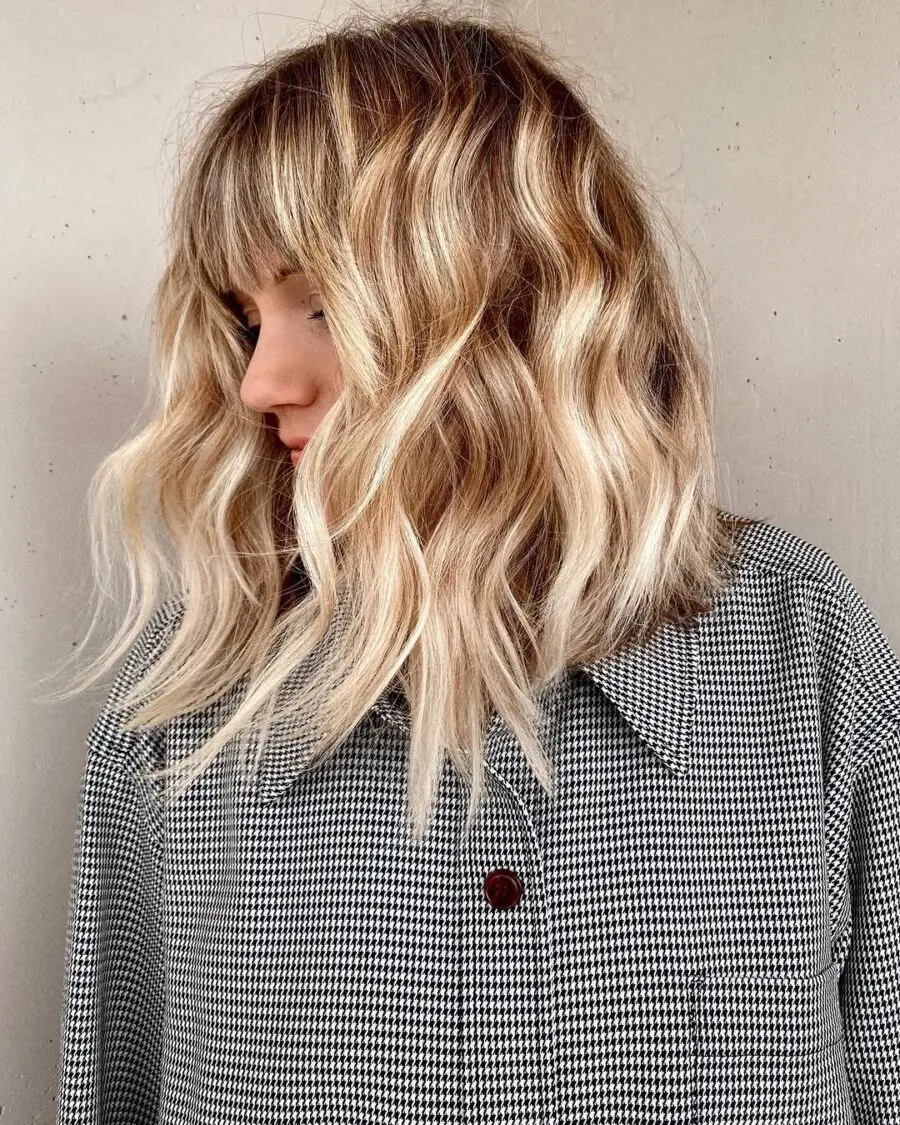 Effortless waves with chic bangs style