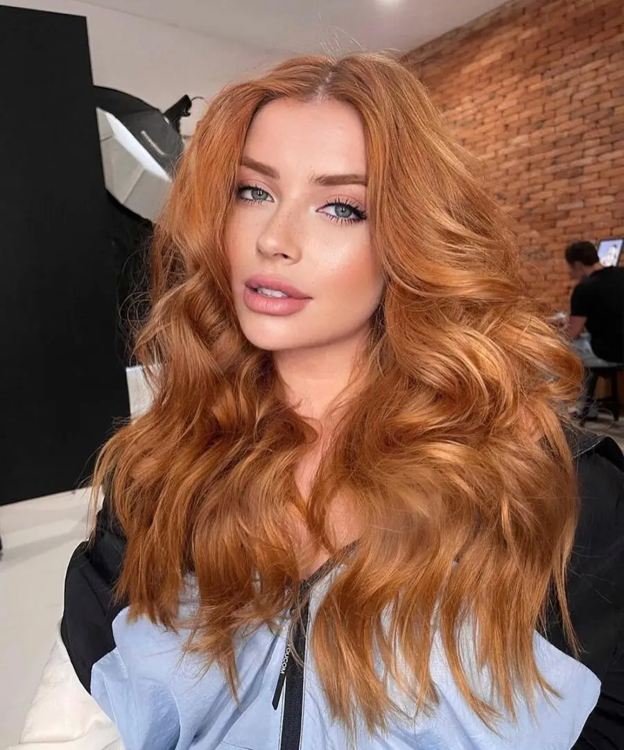 Stunning Wavy Strawberry Blonde Hairstyle
