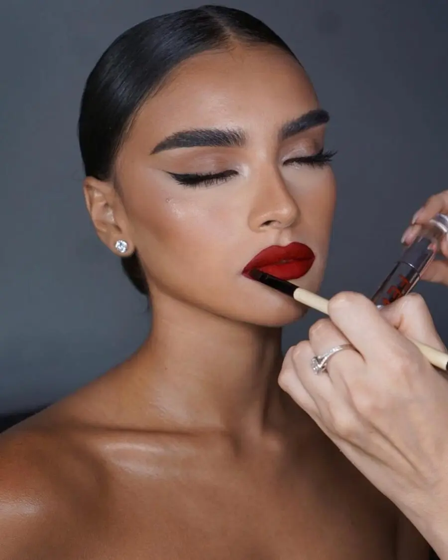 Glamorous red lipstick and sleek eyeliner look