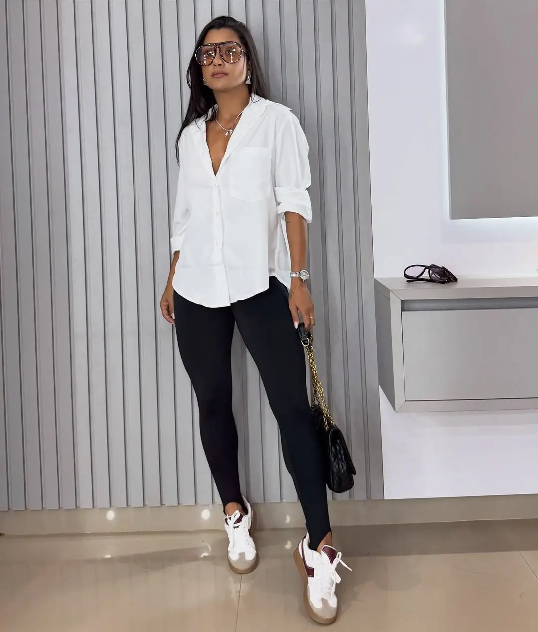 Chic summer look with black leggings and white shirt