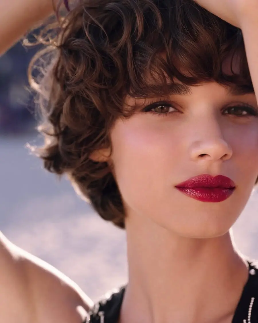 Glossy red lips perfect for summer vibes