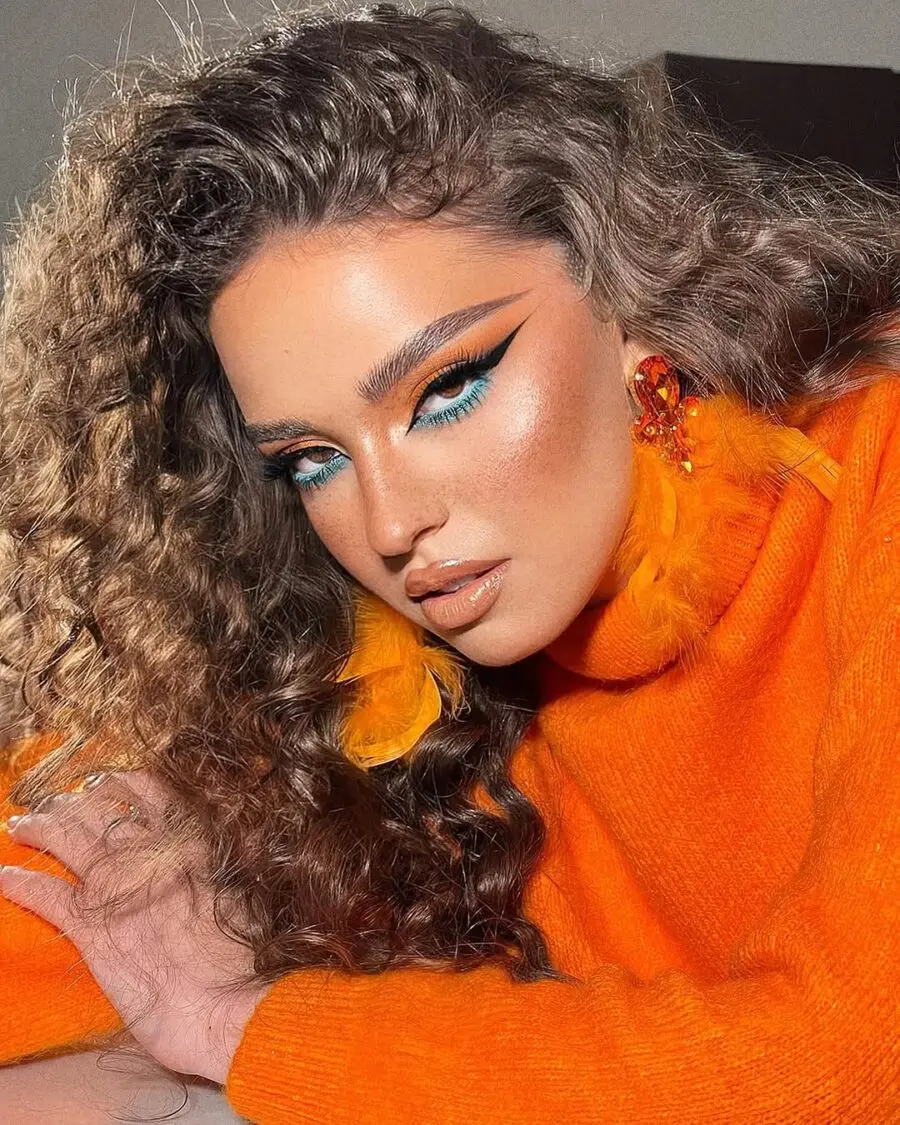 Bold Orange Glam with Vibrant Blue Accents