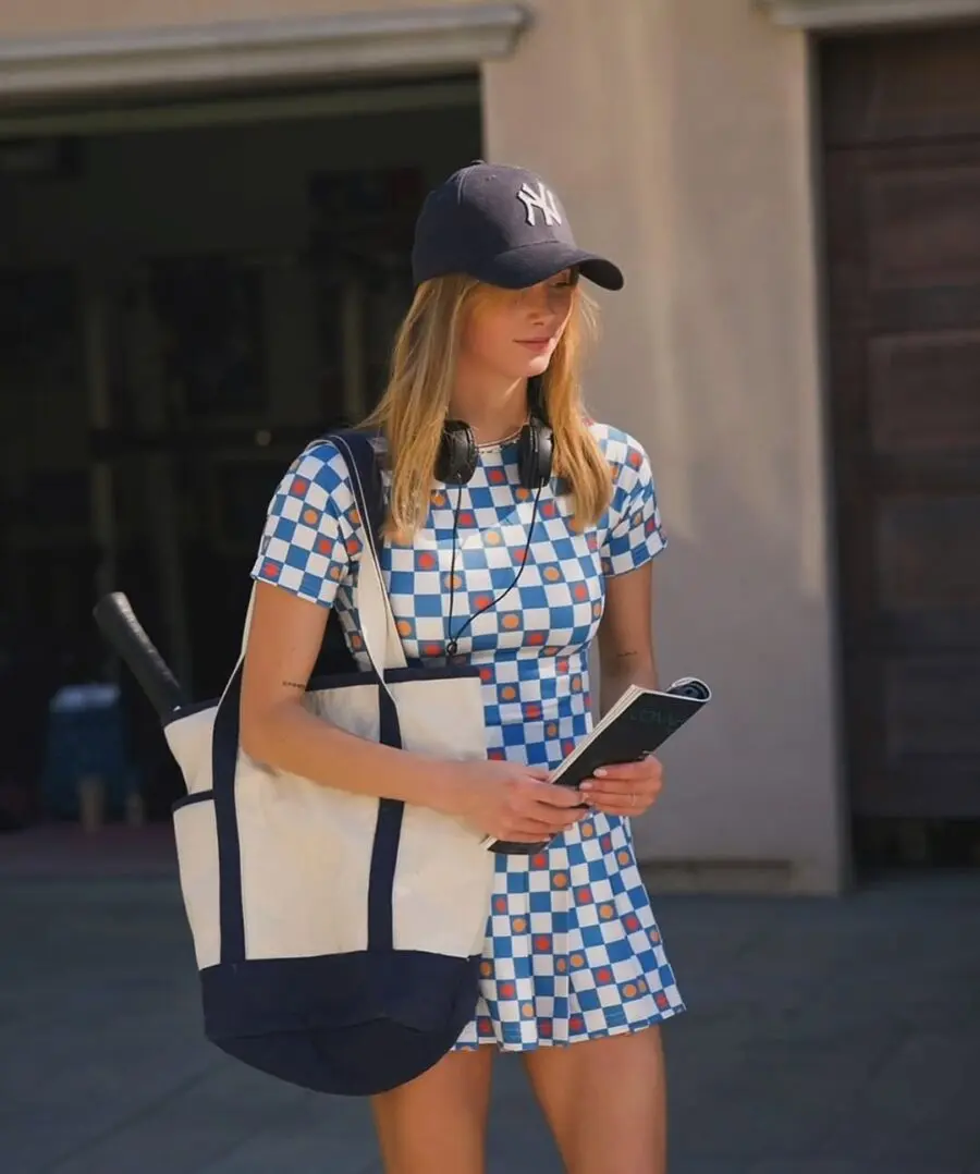 Stylish look pairing cap and relaxed strands