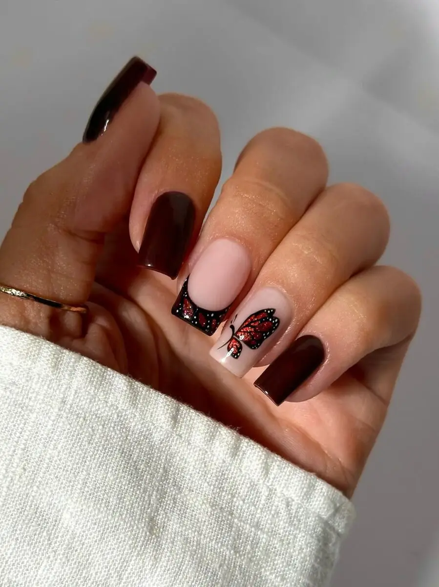 Chic butterfly nail art for trendy vibes