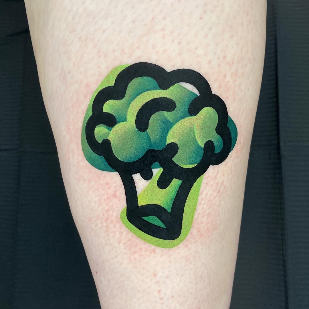 Playful broccoli tattoo with vibrant colors