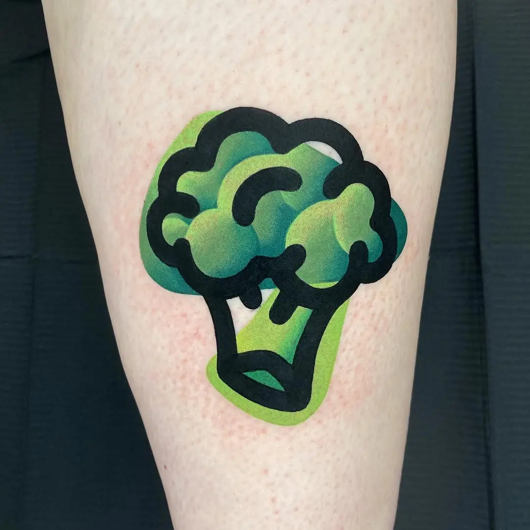 Playful broccoli tattoo with vibrant colors
