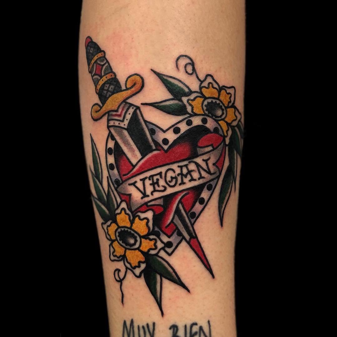 Bold Vegan Heart with Dagger Tattoo Design