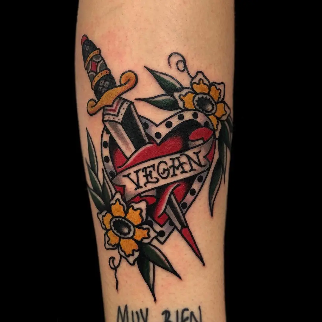 Bold Vegan Heart with Dagger Tattoo Design