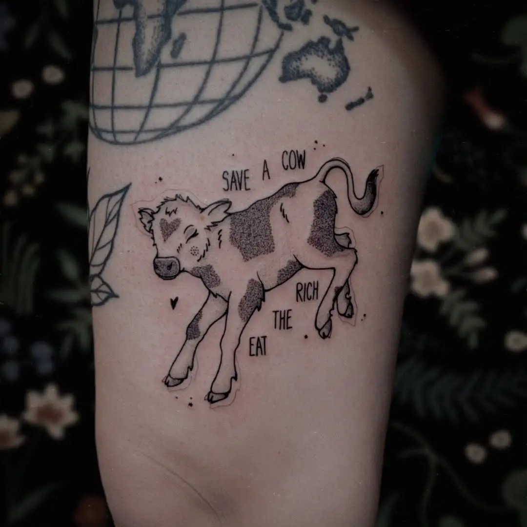 Whimsical calf tattoo with a vegan message